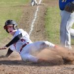 Kenais Jaryn Zoda slides home safely in a conference game against Kodiak Thursday, May 16, 2019, at the Kenai Little League Fields in Kenai, Alaska. (Photo by Joey Klecka/Peninsula Clarion)
