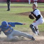 Kenai catcher Simon Grenier hauls in the relay throw too late against Kodiak baserunner Dylan Wynn Thursday, May 16, 2019, at the Kenai Little League Fields in Kenai, Alaska. (Photo by Joey Klecka/Peninsula Clarion)
