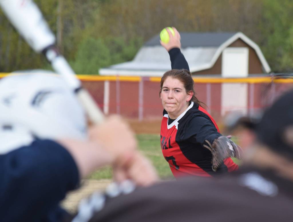 Kenais Kaylee Lauritsen offers up a pitch to a Soldotna batter Friday, May 17, 2019, at Steve Shearer Memorial Ballpark in Kenai, Alaska. (Photo by Joey Klecka/Peninsula Clarion)