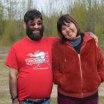 Participants in the annual Special Olympics Torch Run smile for a photo outside the Soldotna Regional Sports Complex in Soldotna Alaska on May 18, 2019. (Photo by Brian Mazurek/Peninsula Clarion)