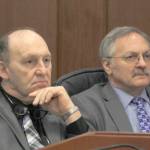 Rep. Gary Knopp, R-Kenai/Soldotna, and Rep. Dave Talerico, R-Healy, sit next to each other after Knopp voted not to confirm Talerico as Speaker of the House on Feb. 5. (Alex McCarthy | Juneau Empire)