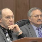 Rep. Gary Knopp, R-Kenai, and Rep. Dave Talerico, R-Healy, sit next to each other after Knopp voted not to confirm Talerico as Speaker of the House on Tuesday. (Alex McCarthy | Juneau Empire)