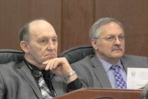 Rep. Gary Knopp, R-Kenai, and Rep. Dave Talerico, R-Healy, sit next to each other after Knopp voted not to confirm Talerico as Speaker of the House on Tuesday. (Alex McCarthy | Juneau Empire)
