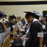 Abigail Bystedt and the other graduates sit in anticipation during the 2019 Nikiski High School graduation in Nikiski, Alaska on May 20, 2019. (Photo by Brian Mazurek/Peninsula Clarion)