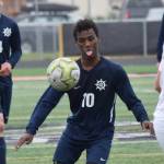 Homers Eyoab Knapp dribbles the ball up the field against Ketchikan Thursday, May 23, 2019, at the Div. II state soccer championships at West High School. (Photo by Joey Klecka/Peninsula Clarion)