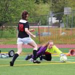Soldotna goalkeeper Katie Delker gets a hand on the ball during the championship game of the Division II state soccer tournament Saturday, May 25, 2019 at Service High School in Anchorage, Alaska. (Photo by Megan Pacer/Homer News)