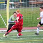 Kenai goalkeeper Braedon Pitsch prepares for a shot from Juneaus Kannon Goetz during the final game of the Division II state soccer championship tournament Saturday, May 25, 2019 at Service High School in Anchorage, Alaska. (Photo by Megan Pacer/Homer News)