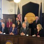 Members of the Alaska Legislatures Legislative Council prepare to speak to media members about preparing for a lawsuit against the governors administration over the future of education funding at the Alaska State Capitol on Tuesday, May 28, 2019. (Alex McCarthy | Juneau Empire)