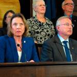 Alaska Senate President Cathy Giessel, seated left, speaks during a news conference on education funding held by state House and Senate leadership on Tuesday, May 28, 2019, in Juneau, Alaska. Seated beside her is House Speaker Bryce Edgmon. (AP Photo/Becky Bohrer)