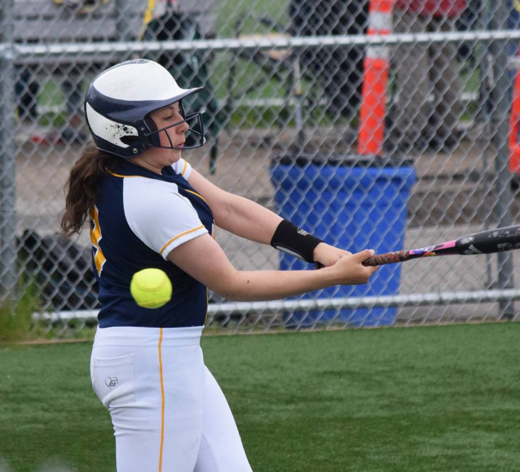 Homers Hannah Hatfield takes a swing at a pitch from Sitkas Makenna Smith at the Division II state softball tournament Friday, May 31, 2019, at Cartee Fields in Anchorage, Alaska.