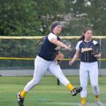 Homers Kaitlyn Johnson (left) attempts to turn a double play against Delta Junction at the Division II state softball tournament Friday, May 31, 2019, at Cartee Fields in Anchorage, Alaska.