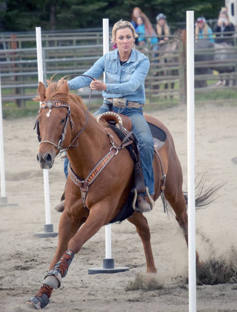 Corey Wilkinson competes in a jackpot race of the Last Frontier Barrel Racers on Friday, May 31, 2019, at the Soldotna Rodeo Grounds in Soldotna, Alaska. (Photo by Jeff Helminiak/Peninsula Clarion)