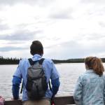 Annalynn Fay, left, David Fink, center, and Sasha Brott look out over Headquarters Lake during a guided hike on Centennial Trail in the Kenai National Wildlife Refuge on June 1, 2019. (Photo by Brian Mazurek/Peninsula Clarion)