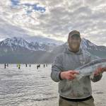 Peter Frank of Seward displays a sockeye salmon he caught in Resurrection Bay in Seward on Saturday. (Photo submitted by Gillian Braver)