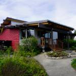 The remodeled Pratt Museum, as seen on May 25, 2019, in Homer, Alaska. The front entrance has been redone, adding some extra space and new steps. Handicap accessibility is to the right of the new entrance through the old porch. (Photo by Michael Armstrong/Homer News)