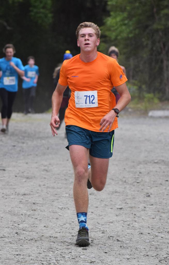Mens 10-mile winner Will Steffe approaches the finish line Saturday, June 8, 2019, at the Run for the River 5-kilometer/10-mile races in Soldotna, Alaska. (Photo by Joey Klecka/Peninsula Clarion)