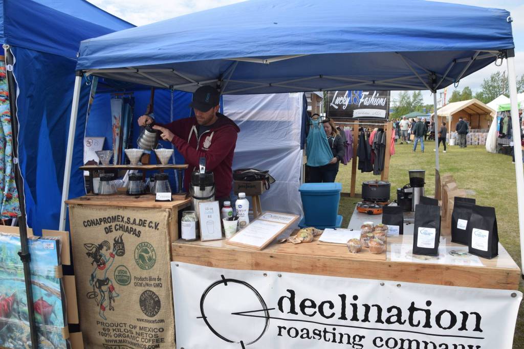 Hollis Swan, owner of Declination Brewing Company, prepares a fresh batch of coffee during the Kenai River Festival at Soldotna Creek Park in Soldotna, Alaska on June 8, 2019. (Photo by Brian Mazurek/Peninsula Clarion)