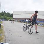 Anchor Points Kevin Chambers rolls out of the exchange zone Sunday, June 9, 2019, in the Tri-The-Kenai Triathlon in Soldotna, Alaska. (Photo by Joey Klecka/Peninsula Clarion)