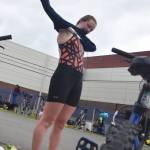 Anchorages Afton Milliman changes clothes as she prepares for the cycling leg Sunday, June 9, 2019, in the Tri-The-Kenai Triathlon in Soldotna, Alaska. (Photo by Joey Klecka/Peninsula Clarion)