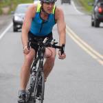 Homers Dan Miotke rides down Gas Well Road Sunday, June 9, 2019, in the Tri-The-Kenai Triathlon in Soldotna, Alaska. (Photo by Joey Klecka/Peninsula Clarion)