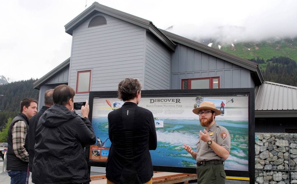 Kenai Fjords National Park Ranger Griffin Plush leads a tour on Saturday, June 8 at the visitor center reopening in Seward, Alaska. (Photo by Kat Sorensen/Peninsula Clarion)