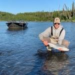 An angler shows off his early run sockeye on the Kenai River in June 2019 near Kenai, Alaska. (Photo submitted by Jason Foster)