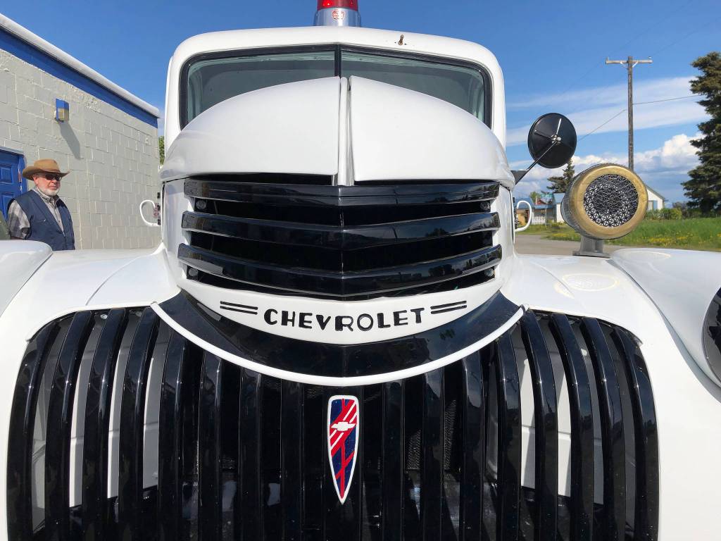 A 1941 Chevrolet 1 1/2 ton firetruck sits outside the Kenai Fine Art Center Thursday, June 6, 2019, during the opening reception to the June exhibit Historic Buildings of Kenai. (Photo by Joey Klecka/Peninsula Clarion)
