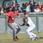 Peninsula Oilers third baseman Bobby Goodloe prepares to catch Jess Davis of the Chugiak-Eagle River Chinooks in a rundown Wednesday, June 12, 2019, at Coral Seymour Memorial Park in Kenai, Alaska. (Photo by Jeff Helminiak/Peninsula Clarion)