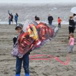 Jasper Webb from Kenai shows off his Iron Man kite during the first Kenai Kite Festival on the Kenai North Beach in Alaska on Saturday, June 15, 2019. (Photo by Brian Mazurek/Peninsula Clarion)