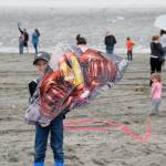 Jasper Webb from Kenai shows off his Iron Man kite during the first Kenai Kite Festival on the Kenai North Beach in Alaska on Saturday, June 15, 2019. (Photo by Brian Mazurek/Peninsula Clarion)