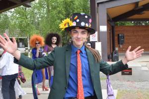 Kaegan Koski strikes a pose during the 2019 Soldotna Pride Celebration in Soldotna Creek Park on Saturday, June 15, 2019. (Photo by Brian Mazurek/Peninsula Clarion)