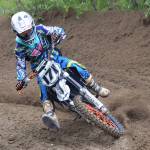 Clarence Martino rips around a corner Saturday, June 15, 2019, at the Alaska State Motocross Championships at Twin City Raceways motocross track in Kenai, Alaska. (Photo by Joey Klecka/Peninsula Clarion)