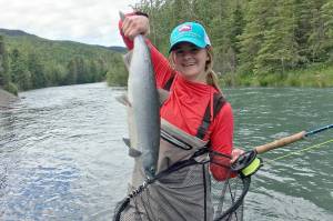 Shelby Harris shows off a sockeye caught on the Upper Kenai River on Saturday, June 15, 2019. (Photo submitted by Shelby Harris)