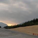 The glow from the Swan Lake Fire can be seen on the horizon from the east entrance of Skilak Lake Road on Sunday, June 23, 2019. The Swan Lake Fire, located just north of Sterling, Alaska, grew to 32,300 acres over the weekend. (Photo by Erin Thompson/Peninsula Clarion)
