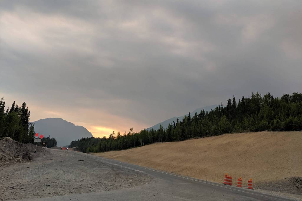 The glow from the Swan Lake Fire can be seen on the horizon from the east entrance of Skilak Lake Road on Sunday, June 23, 2019. The Swan Lake Fire, located just north of Sterling, Alaska, grew to 32,300 acres over the weekend. (Photo by Erin Thompson/Peninsula Clarion)