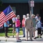 People gather for a rally against the Pebble Mine in front of Sen. Lisa Murkowskis Juneau office on Tuesday, June 25, 2019. The rally was organized by The Alaska Center, an Anchorage-based environmental organization. (Michael Penn | Juneau Empire)