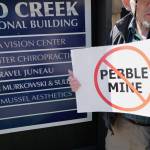 Patrick Kearney gathers for a rally against the Pebble Mine in front of Sen. Lisa Murkowskis Juneau office on Tuesday. (Michael Penn | Juneau Empire)