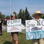 Residents line the Sterling Highway, in front of Sen. Lisa Murkowskis office to oppose Pebble mine on Wednesday, June 26, 2019, in Soldotna, Alaska. (Photo by Victoria Petersen/Peninsula Clarion)