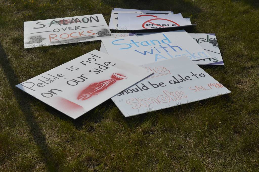 Ready-made signs awaited residents at a rally against Pebble mine in front of Sen. Lisa Murkowskis Soldotna office on Wednesday, June 26, 2019, in Soldotna, Alaska. (Photo by Victoria Petersen/Peninsula Clarion)