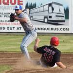 Anchorage Glacier Pilots second baseman Zach Sehgal (left) looks to turn a double play in front of Peninsula Oilers runner John Mackay, Friday, June 28, 2019, at Coral Seymour Memorial Park in Kenai. (Photo by Joey Klecka/Peninsula Clarion)