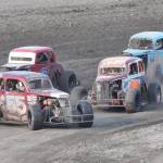 The #55 Legends car of David Kusmider spins in front of the field Saturday, June 29, 2019, at Twin Cities Raceway in Kenai, Alaska. (Photo by Joey Klecka/Peninsula Clarion)