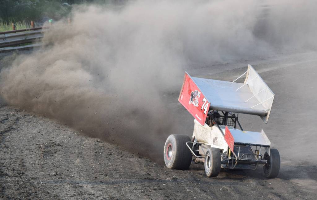 The #74 Sprint car of Elton McGahan drifts through a corner Saturday, June 29, 2019, at Twin Cities Raceway in Kenai, Alaska. (Photo by Joey Klecka/Peninsula Clarion)