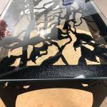 Birch Branch Table, a steel and glass designed table by Chelline Larsen and Adam Hoyt sits in the gallery Tuesday at the Kenai Fine Art Center in Kenai. (Photo by Joey Klecka/Peninsula Clarion)