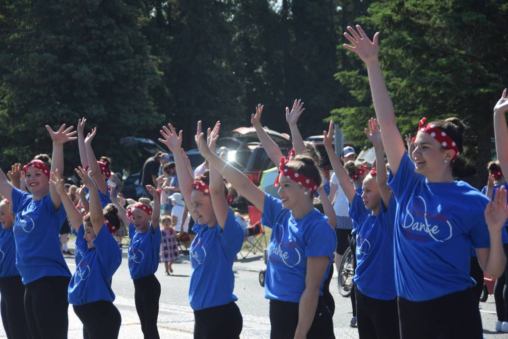 Forever Dance Alaska performs for the crowd during the July 4th parade in Kenai, Alaska. (Photo by Brian Mazurek/Peninsula Clarion)