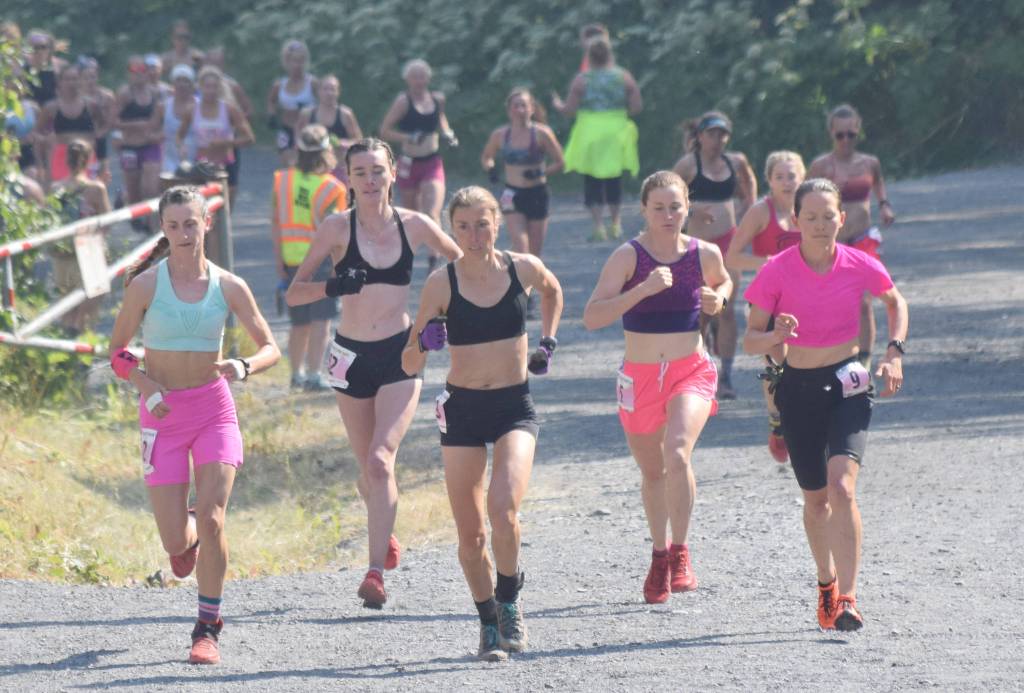 Denali Foldager-Strabel, Alice Baker, Christy Marvin, Hannah Lafleur and Julianne Dickerson form the lead pack attacking the mountain in the womens Mount Marathon Race on Thursday, July 4, 2019, in Seward, Alaska. (Photo by Jeff Helminiak/Peninsula Clarion)