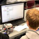 Students works on programming his Lego robot in the LEGO robotics UAA College of Engineering Summer Engineering Academies, on Wednesday, June 26, 2019, at the Kenai Peninsula College near Soldotna, Alaska. (Photo by Victoria Petersen/Peninsula Clarion)