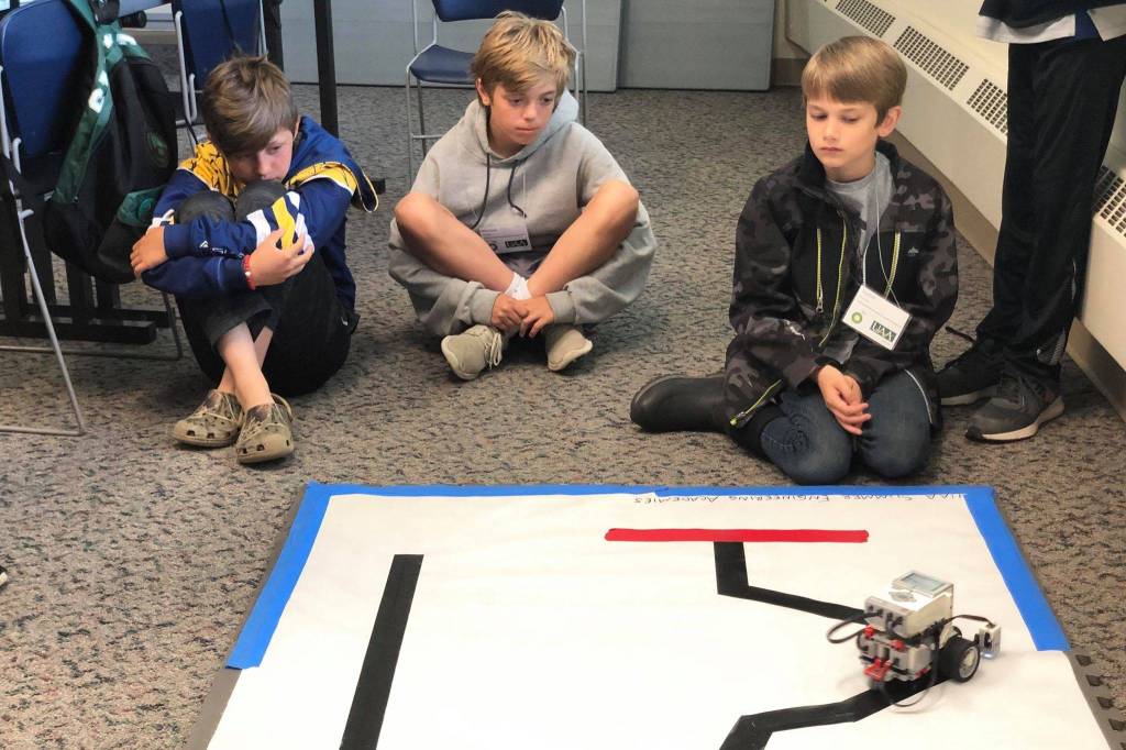 Students put their robot to the test in one of the many challenges in the Lego robotics UAA College of Engineering Summer Engineering Academies, on Wednesday, June 26, 2019, at the Kenai Peninsula College near Soldotna, Alaska. (Photo by Victoria Petersen/Peninsula Clarion)