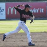 Peninsula Oilers shortstop Skyler Messinger delivers a throw to first on a Mat-Su Miners grounder Friday at Coral Seymour Memorial Park in Kenai. (Photo by Joey Klecka/Peninsula Clarion)