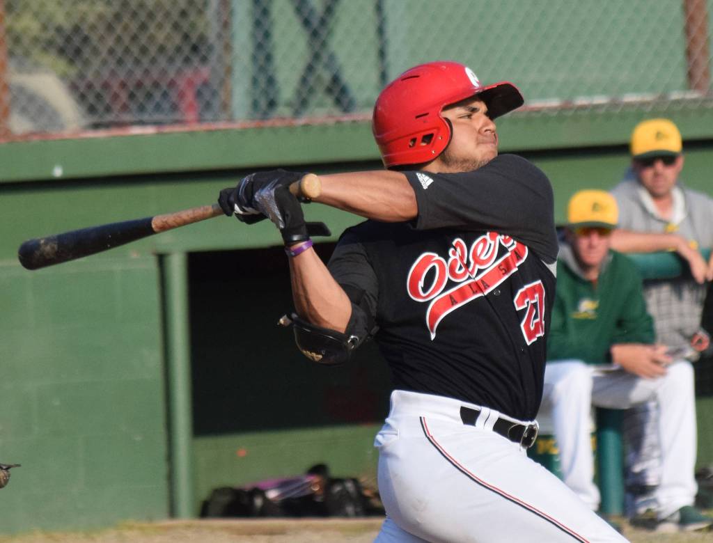 Peninsula Oilers batter Jonathan Villa takes a swing at a pitch from Mat-Su Miner pitcher Brandon Birdsell Friday at Coral Seymour Memorial Park in Kenai. (Photo by Joey Klecka/Peninsula Clarion)