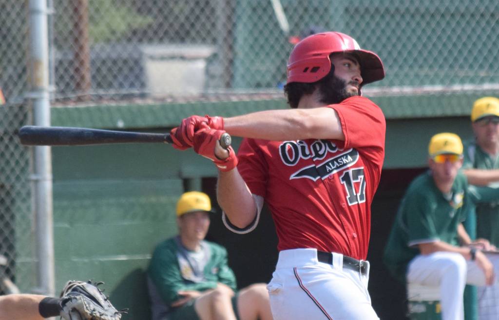 Peninsula Oilers designated hitter Calvin Farris swings at a pitch Sunday, July 7, 2019, against the Mat-Su Miners at Coral Seymour Memorial Park in Kenai, Alaska. (Photo by Joey Klecka/Peninsula Clarion)